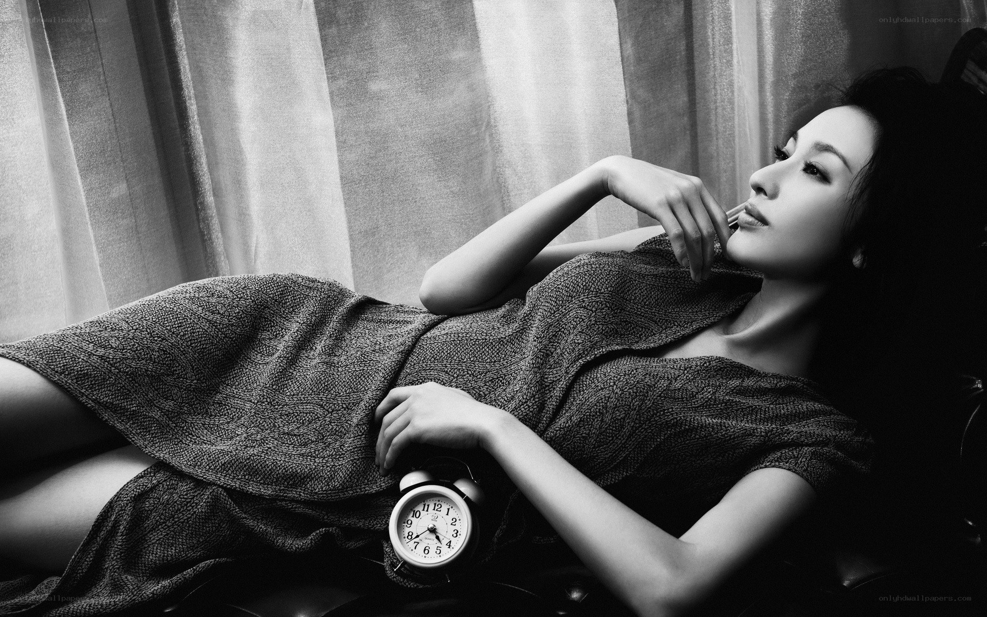 woman with alarm clock