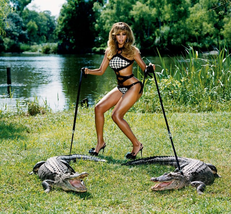Woman with alligators in park