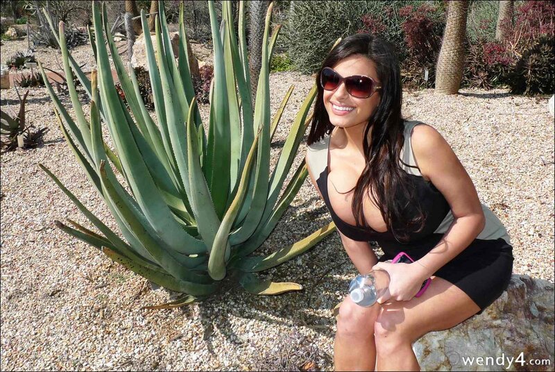 Woman with aloe plant