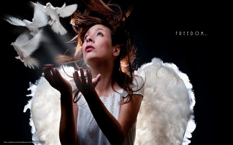 woman with angel wings and doves