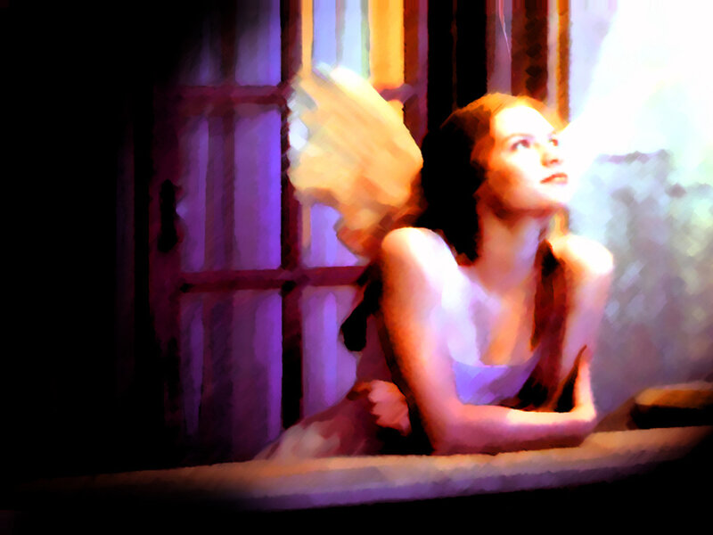 woman with angel wings at window