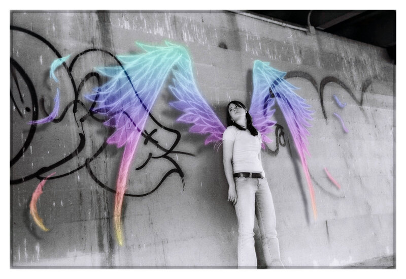 woman with angel wings graffiti