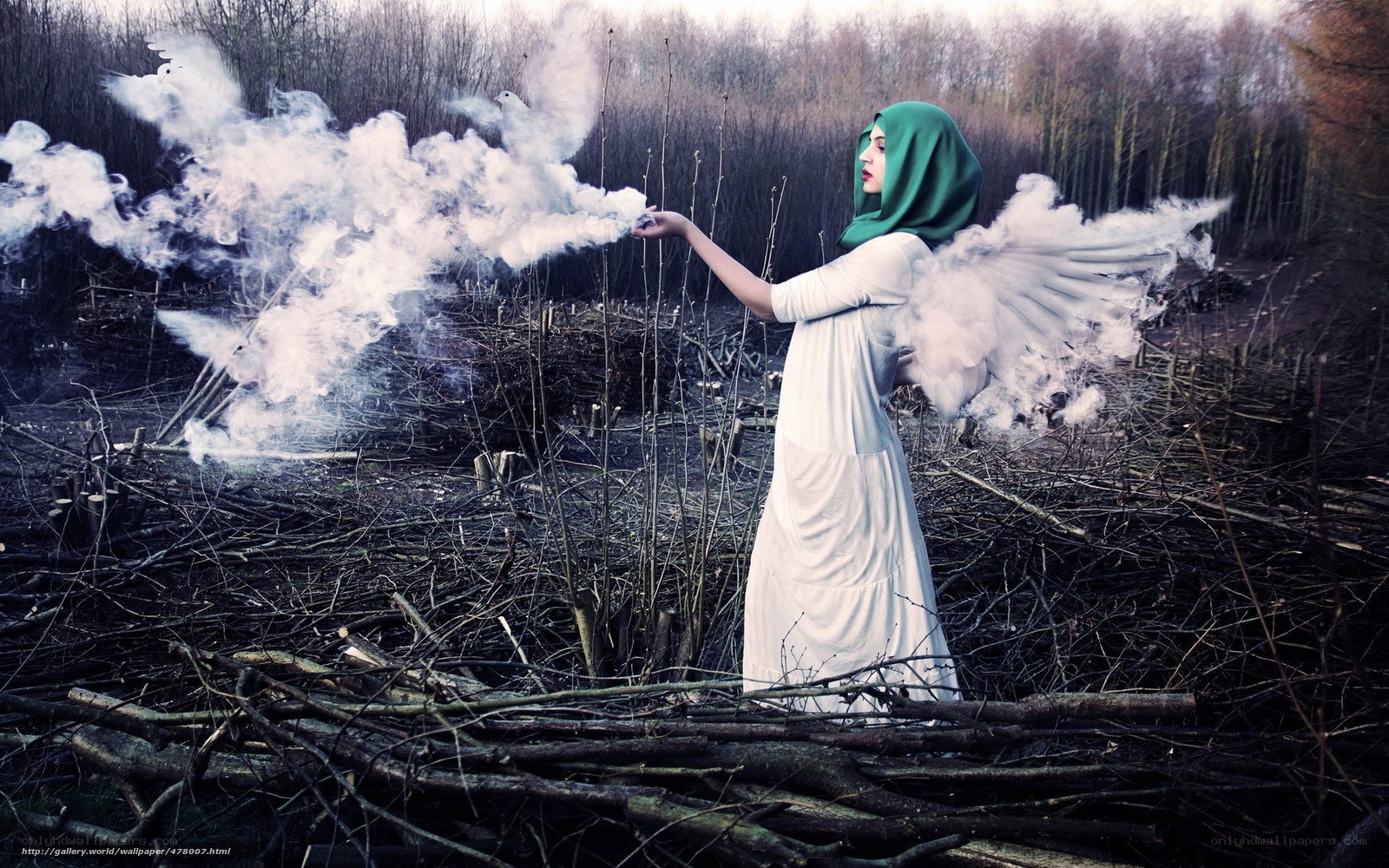 woman with angel wings in forest