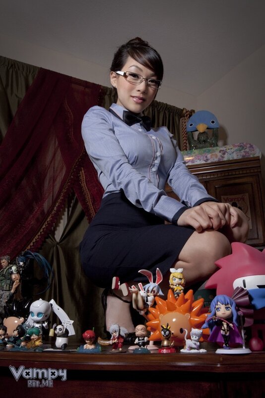 Woman with anime figurines