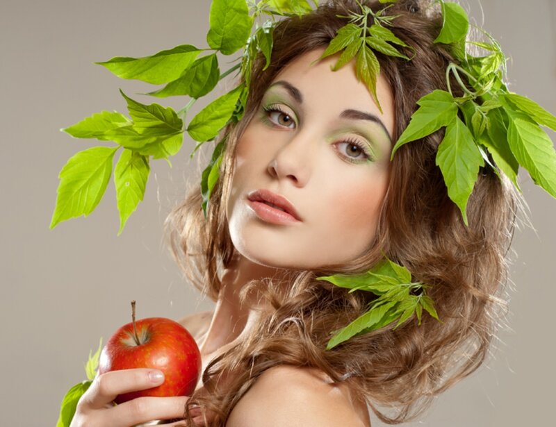 Woman with Apple and Leaves