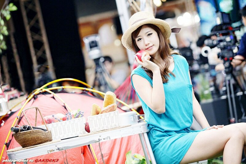 Woman with apple at picnic