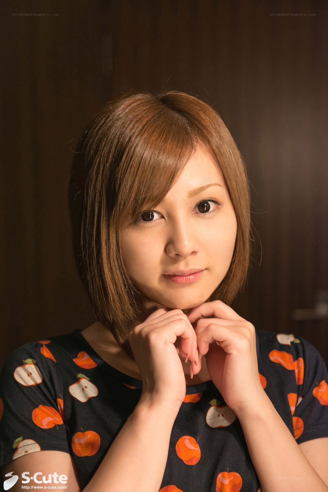 woman with apple pattern shirt