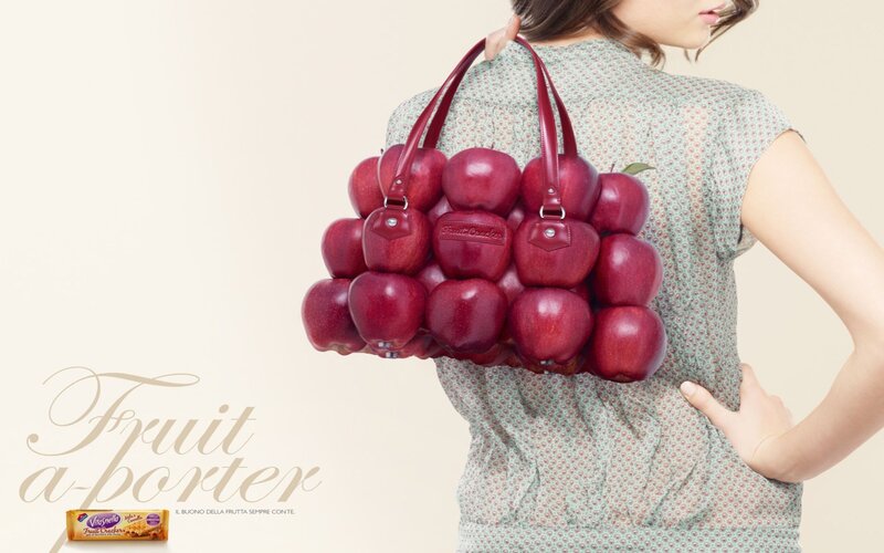 woman with apple purse