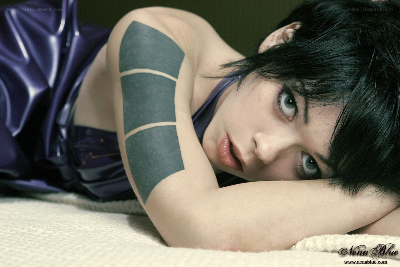 woman with arm tattoos