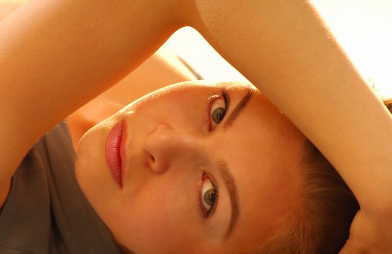 woman with arms above head