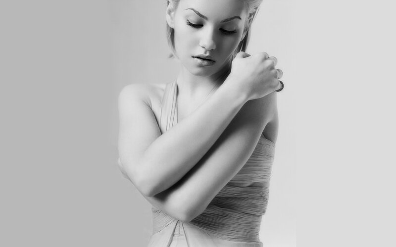 Woman with Arms Crossed — Black, Contemplative
