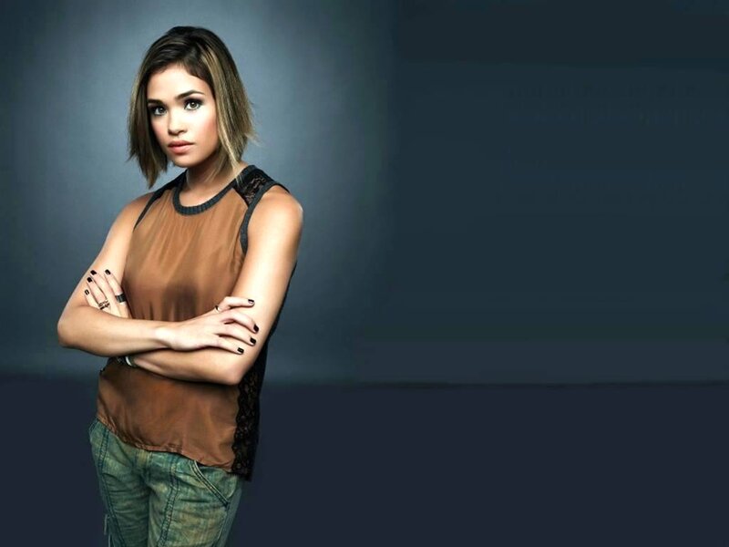 Woman with Arms Crossed — Brown, Confident