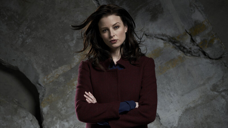 Woman with Arms Crossed — Maroon