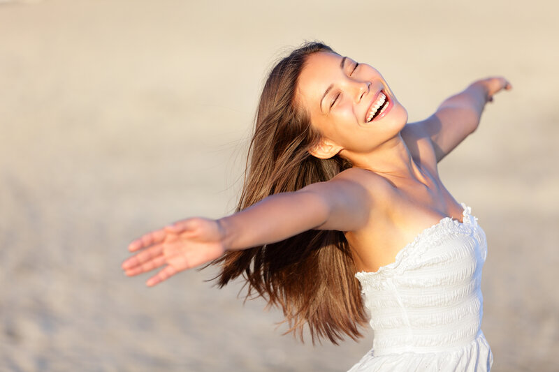 Woman with Arms Outstretched — White, Joyful, Sunset