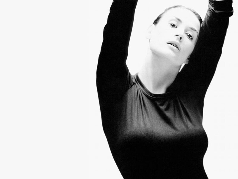 woman with arms raised