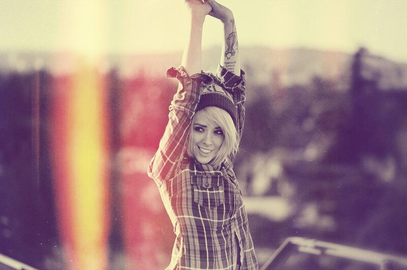 woman with arms raised