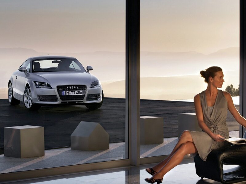 Woman with Audi TT car