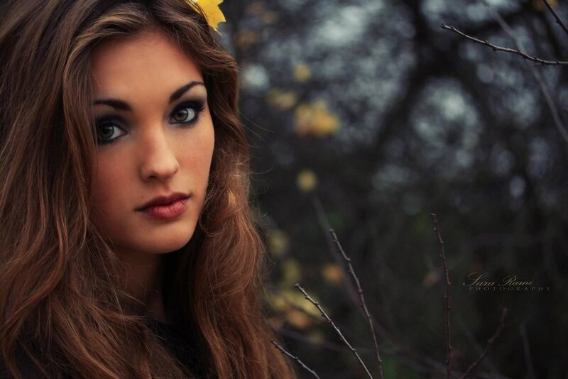 woman with autumn leaf