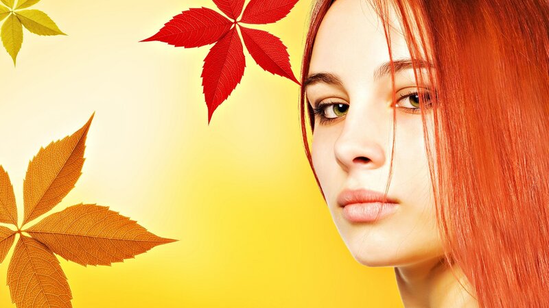 woman with autumn leaves