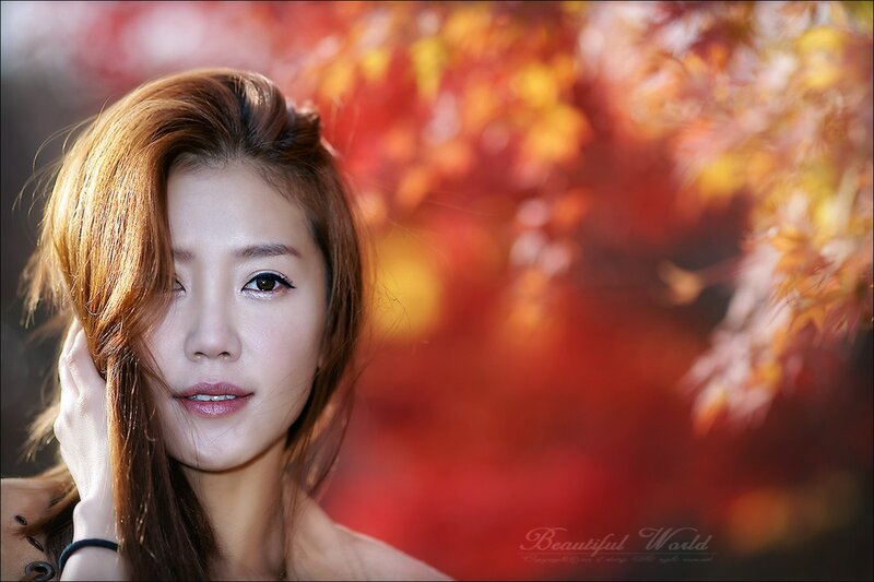 woman with autumn leaves