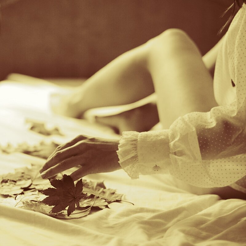 woman with autumn leaves