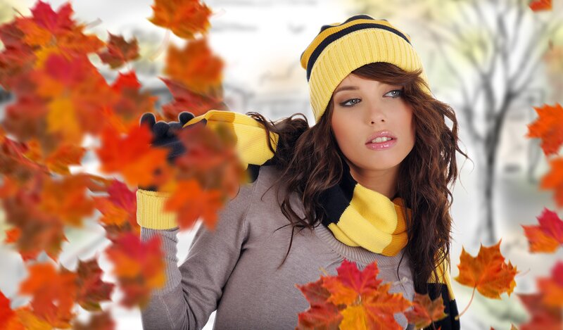 woman with autumn leaves