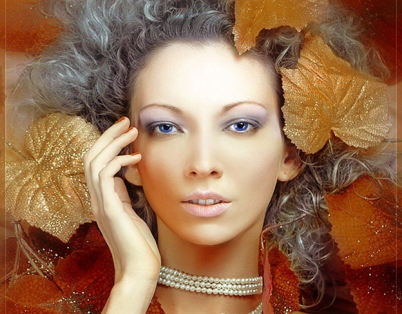 woman with autumn leaves
