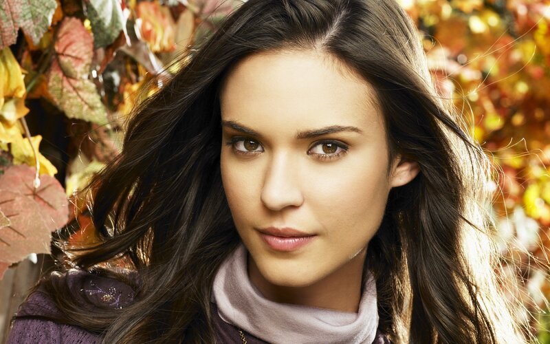 woman with autumn leaves background
