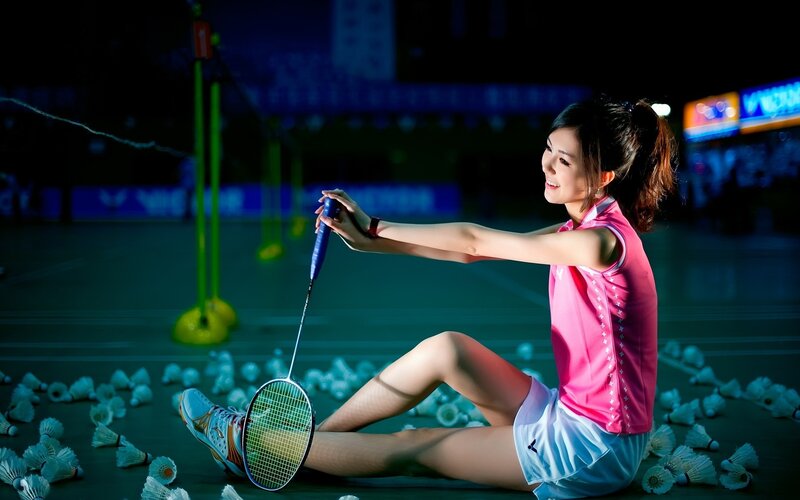 woman with badminton racket