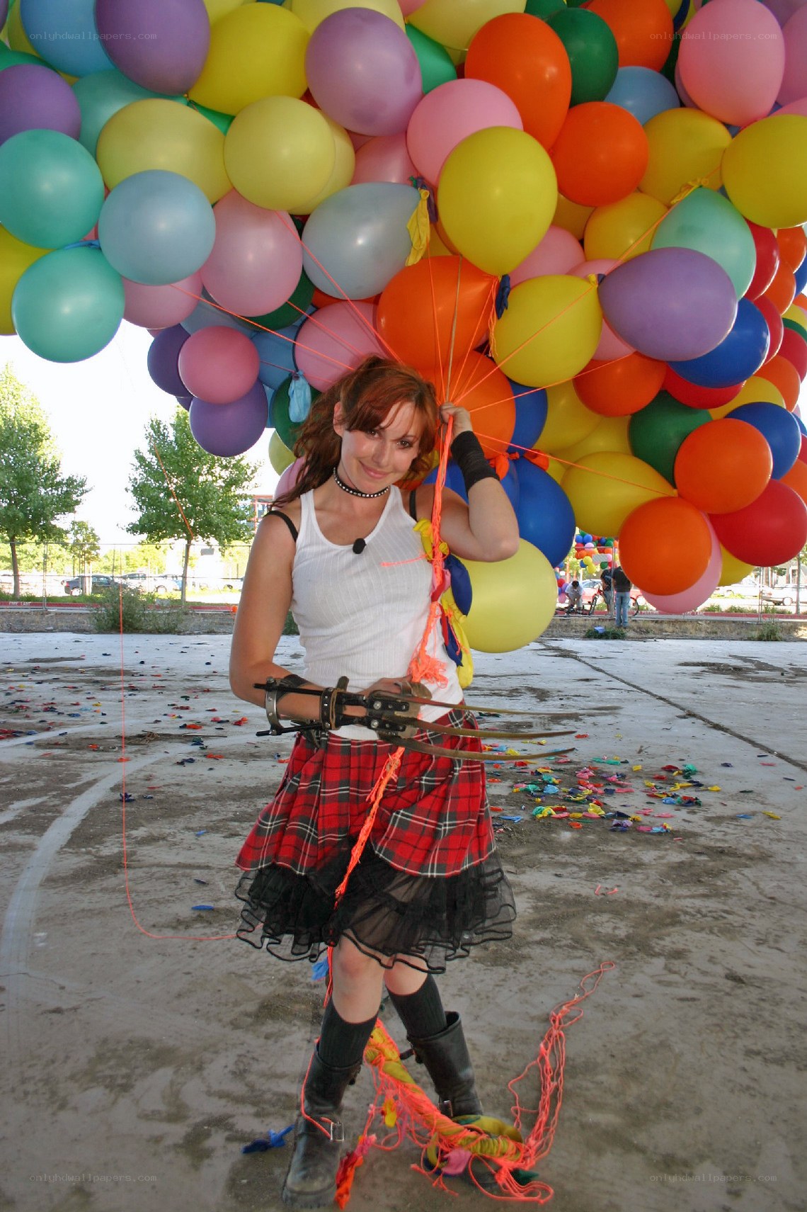 Woman with balloons and claws