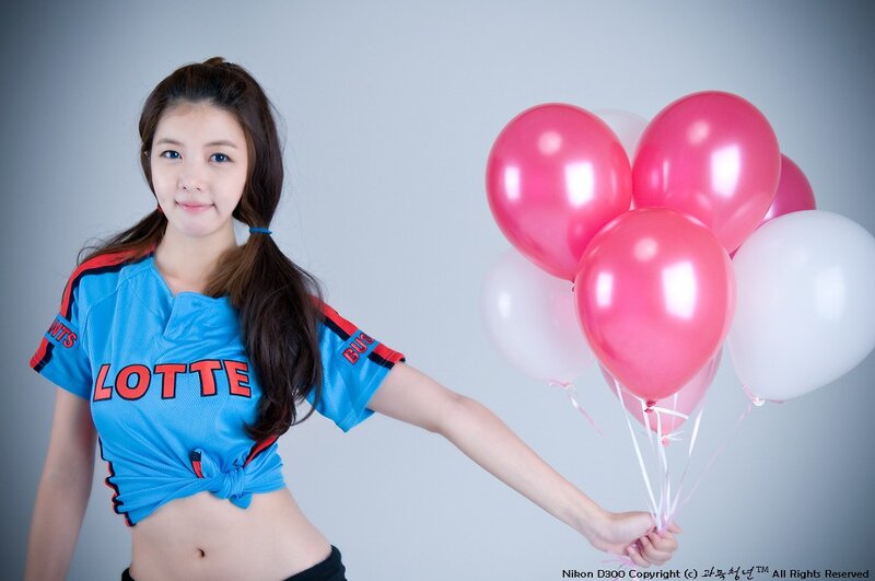 Woman with balloons in jersey
