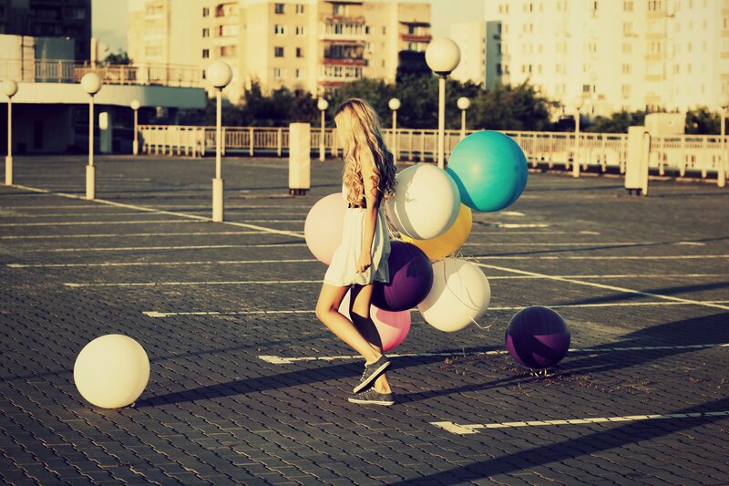 Woman with Balloons — Yellow, Serene, Sunset, Photograph