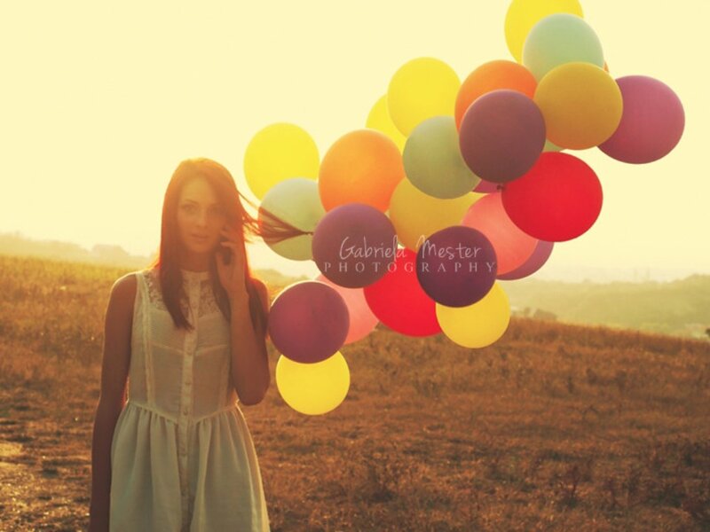 Woman with Balloons — Yellow, Serene, Sunset