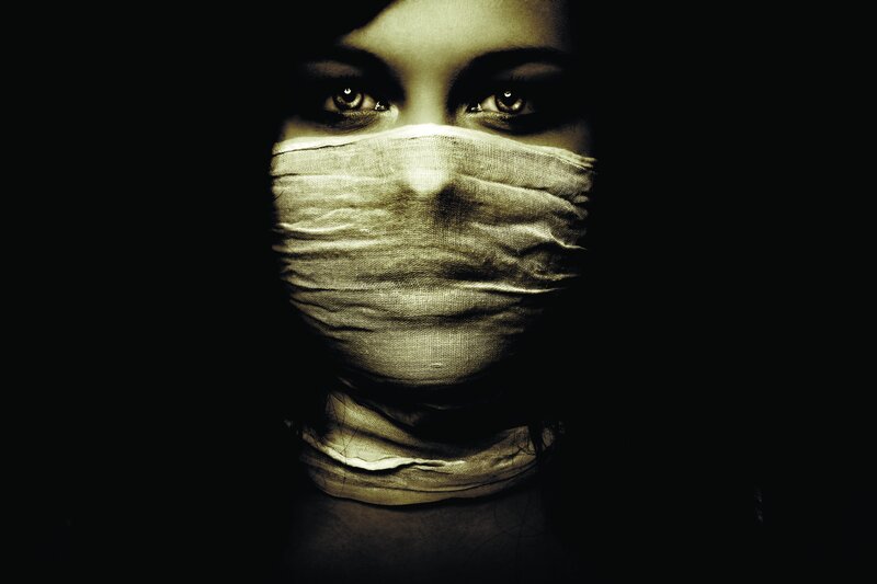 woman with bandaged face