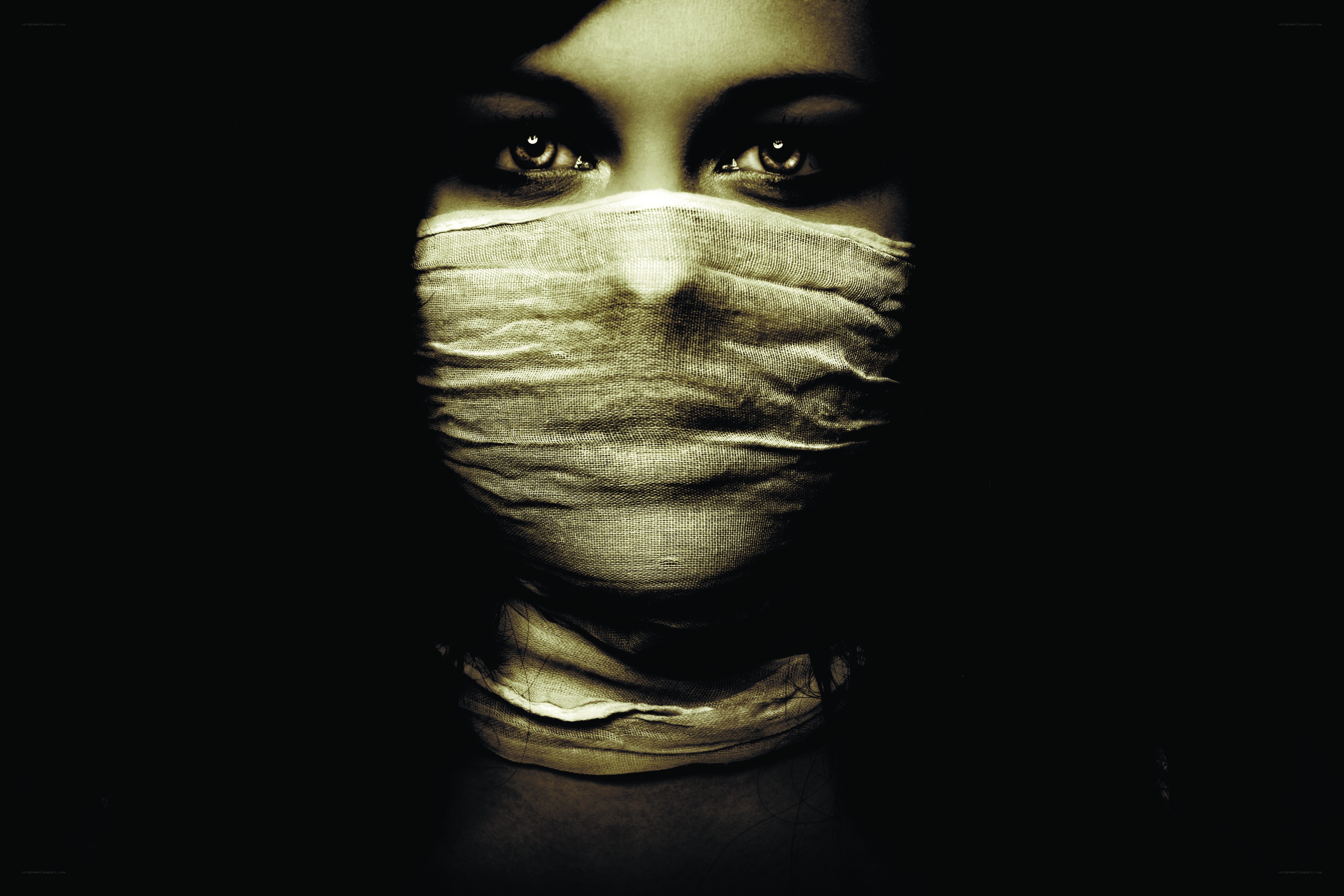 woman with bandaged face