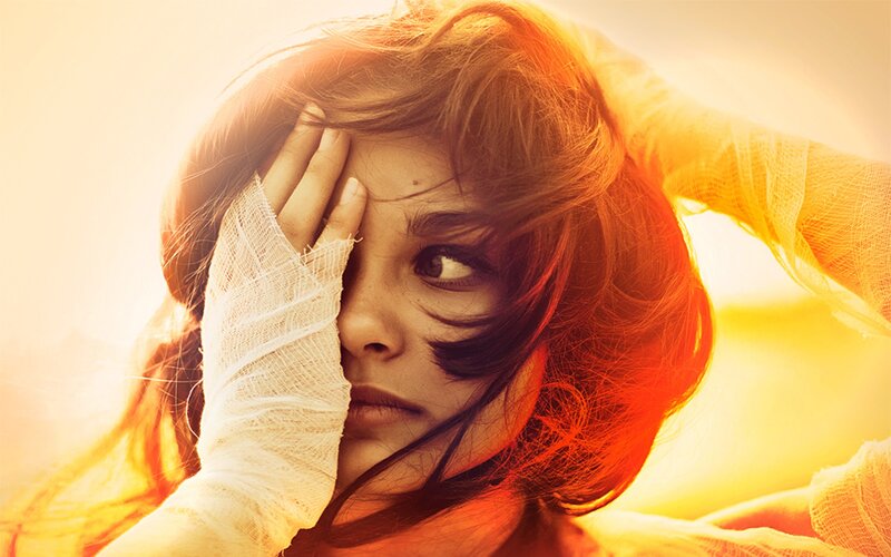 woman with bandaged hand