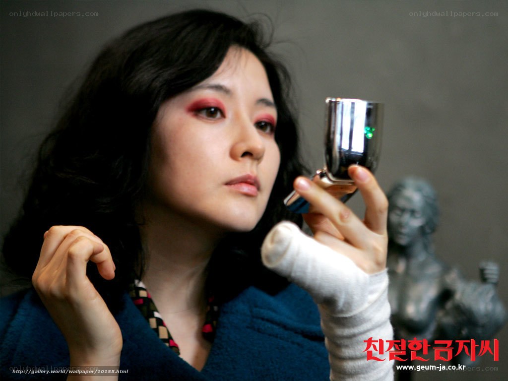 woman with bandaged hand holding object