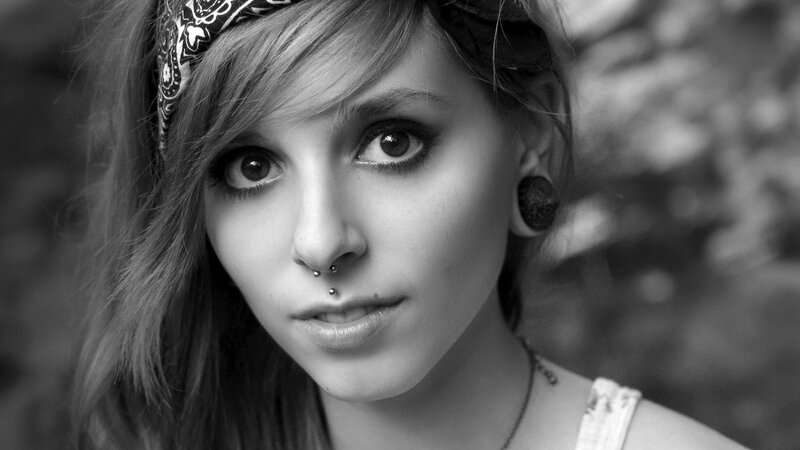 woman with bandana and piercings