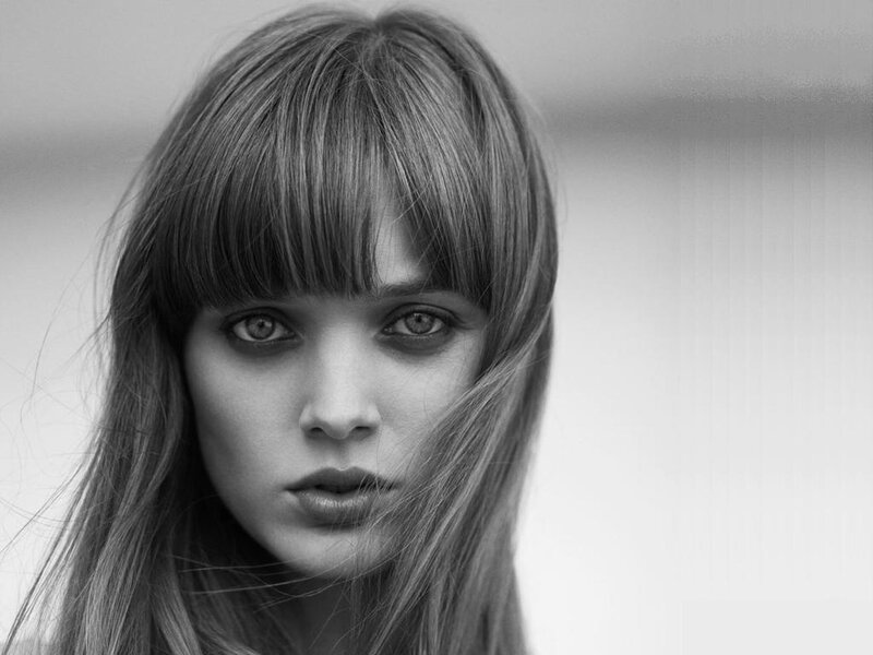 Woman with Bangs — Black, Serious