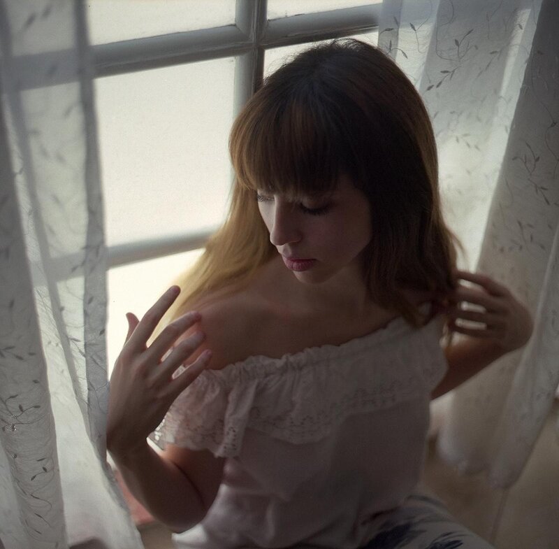 Woman with Bangs by Window