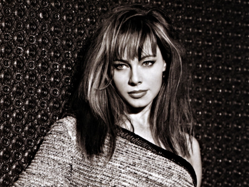 woman with bangs in black and white