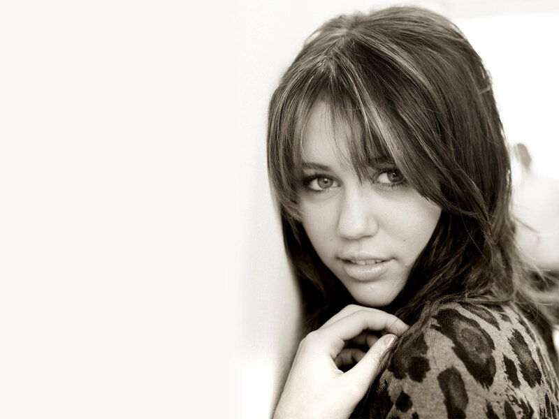 woman with bangs in black and white