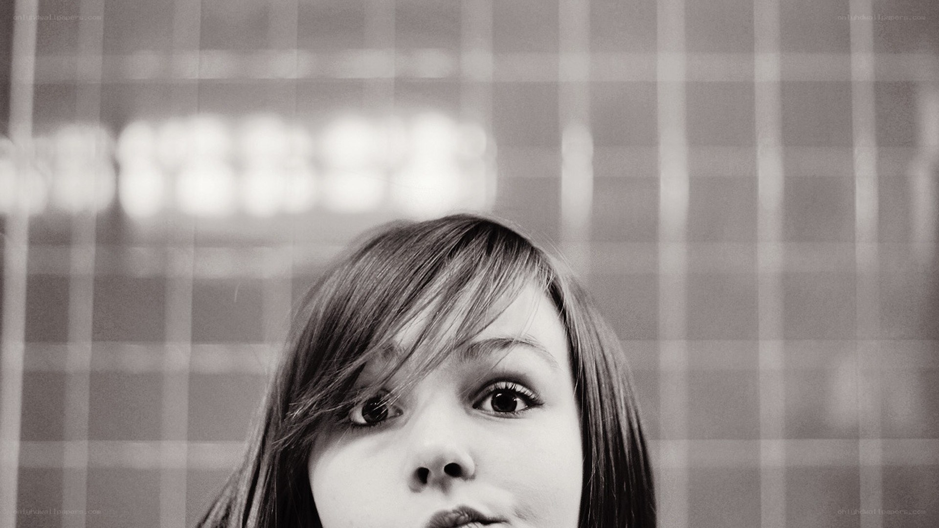 woman with bangs looking up