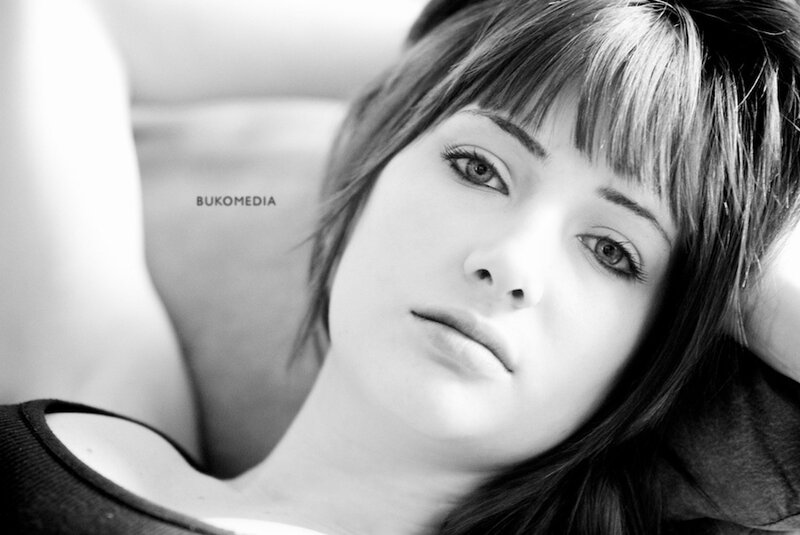 Woman with Bangs Lying Down