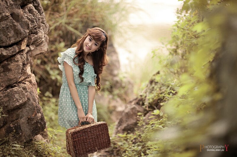 Woman with basket in nature