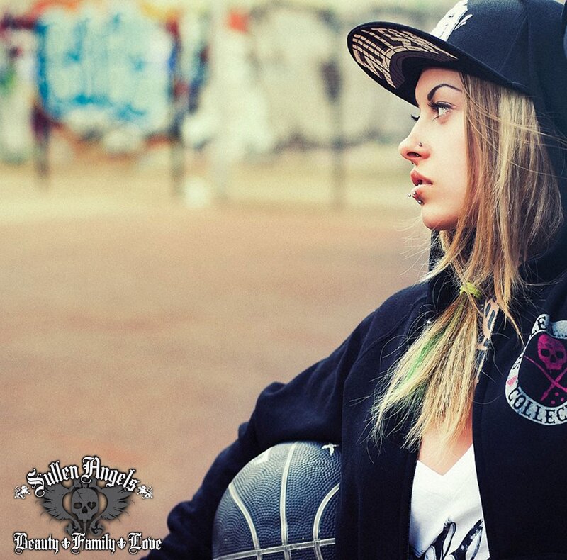 woman with basketball in urban setting