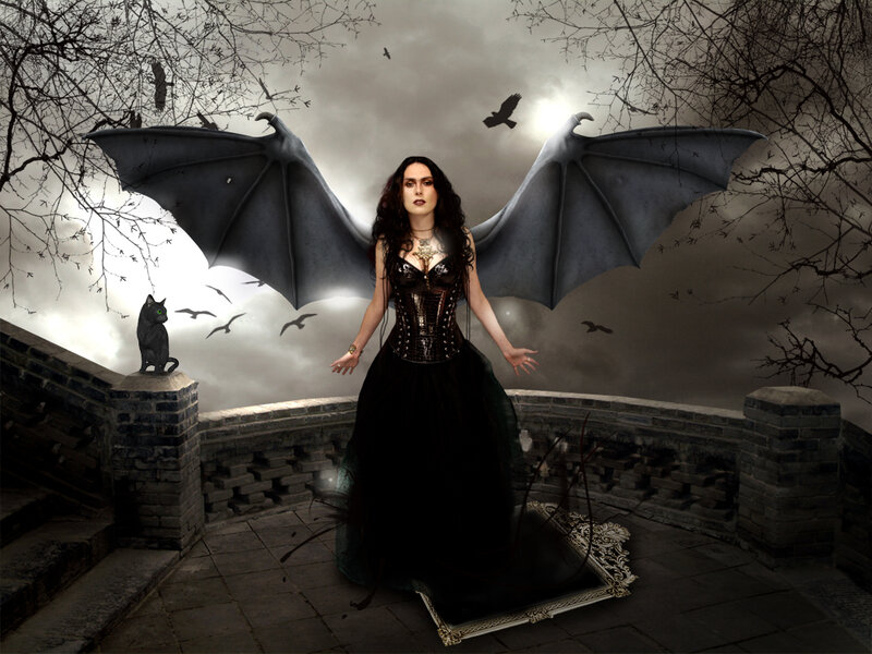 woman with bat wings on a bridge