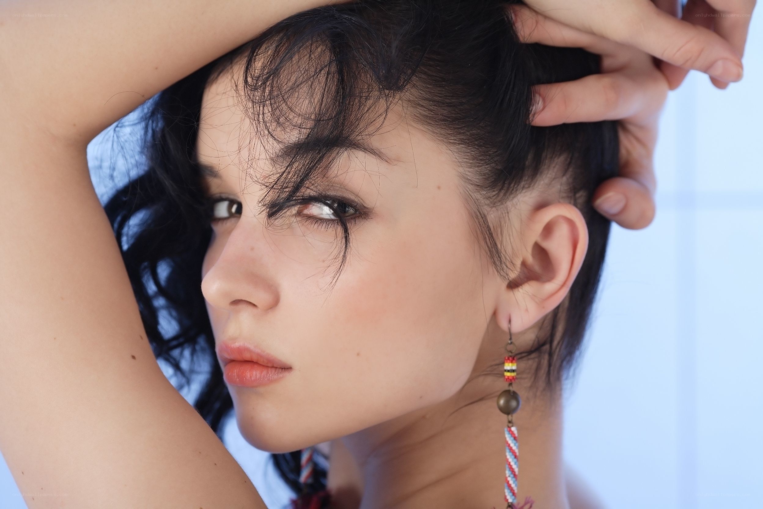 woman with beaded earring