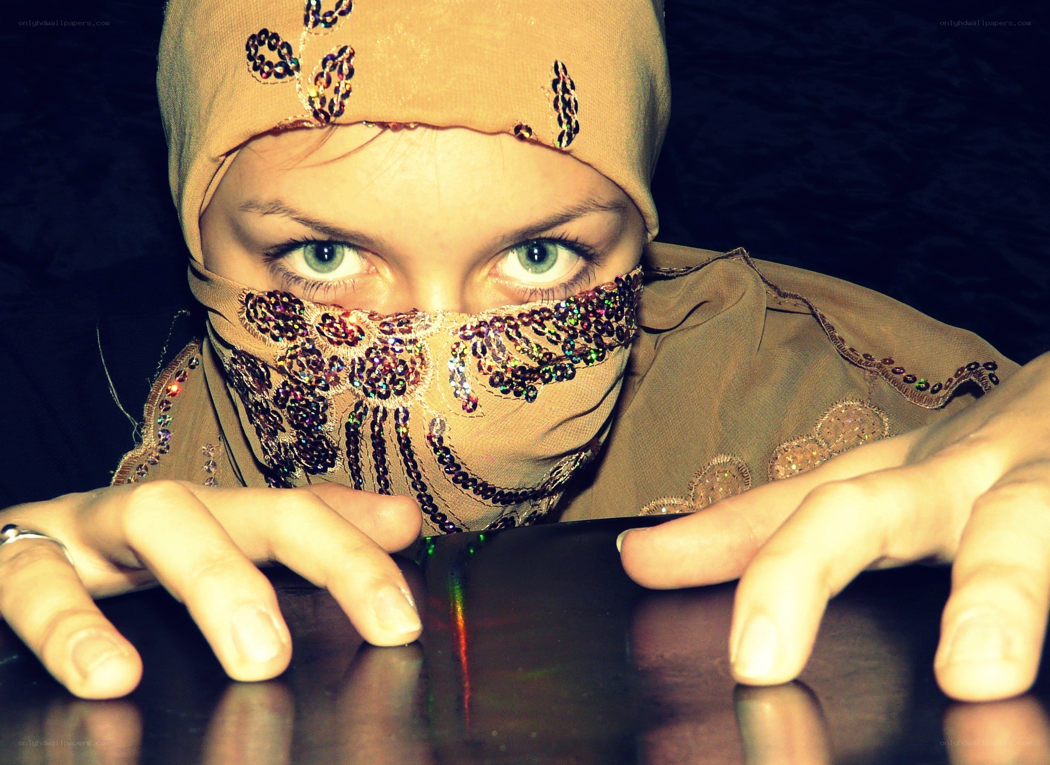 woman with beaded face covering