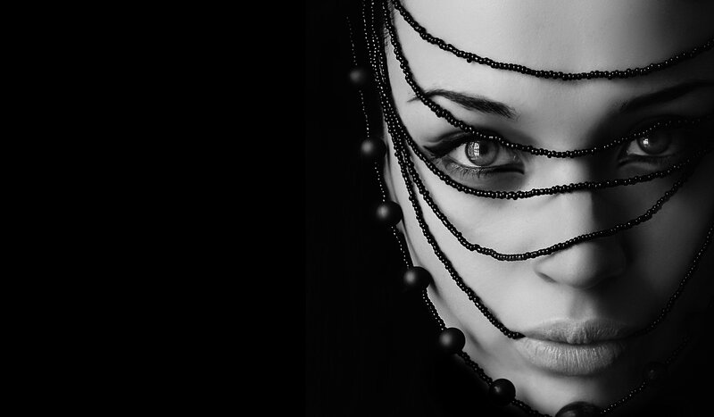 woman with beaded face mask